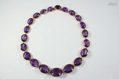 A VICTORIAN AMETHYST RIVIERE NECKLACE the graduated oval-sha...