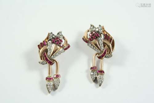 A PAIR OF RUBY AND DIAMOND EARCLIPS each earring set with ca...
