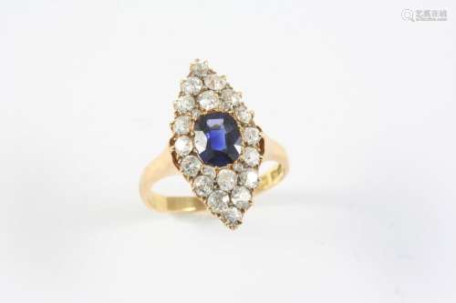 A SAPPHIRE AND DIAMOND MARQUISE-SHAPED CLUSTER RING the oval...