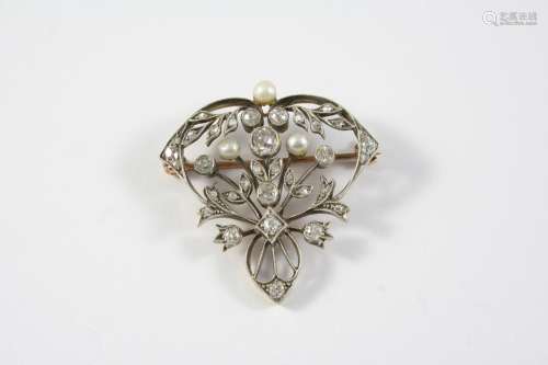 A LATE VICTORIAN DIAMOND AND PEARL SET BROOCH the foliate op...