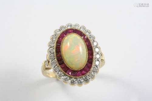 AN OPAL, RUBY AND DIAMOND CLUSTER RING the oval-shaped white...