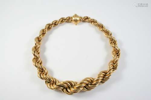 A GOLD NECKLACE BY HERMES of graduated rope design, with a d...