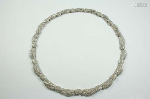 A DIAMOND COLLAR NECKLACE set overall with circular-cut diam...