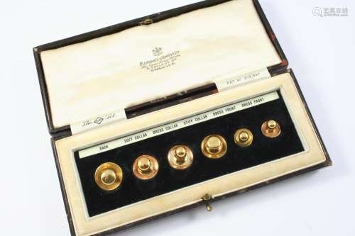 A CASED SET OF SIX 18CT GOLD DRESS STUDS total weight 7.2 gr...