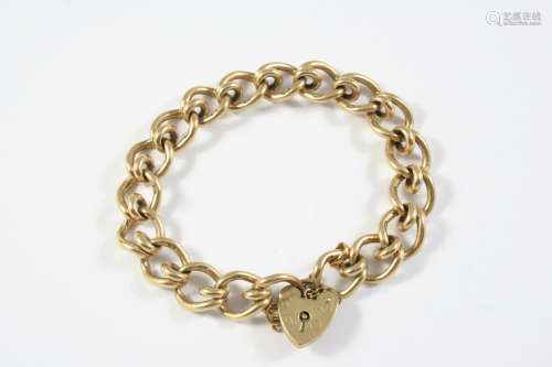 A 9CT GOLD FANCY CURB LINK BRACELET with two padlock clasps,...