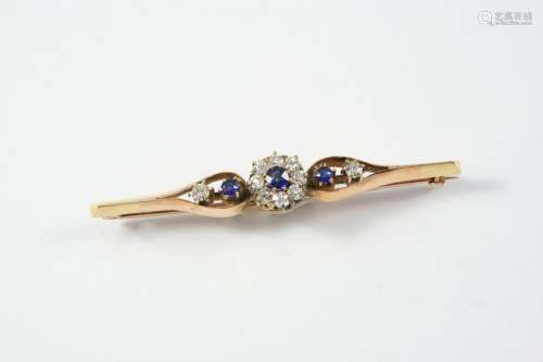 A SAPPHIRE AND DIAMOND BROOCH the central cluster is set wit...