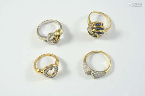 AN 18CT TWO COLOUR GOLD AND DIAMOND RING set with circular-c...