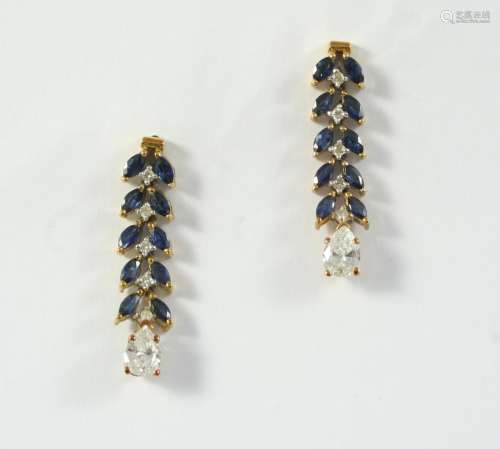 A PAIR OF SAPPHIRE AND DIAMOND DROP EARRINGS of foliate form...