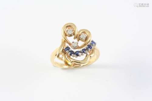 A SAPPHIRE AND DIAMOND RING the yellow gold openwork mount i...