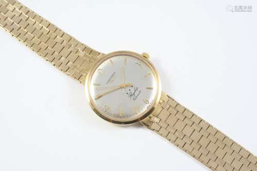 A GENTLEMAN'S 9CT GOLD AUTOMATIC FLAGSHIP WRISTWATCH BY LONG...