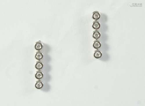 A PAIR OF DIAMOND DROP EARRINGS each earring mounted with fi...