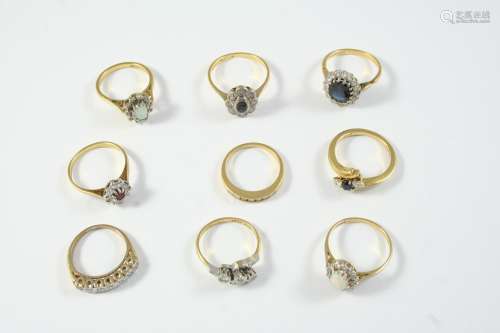 TEN ASSORTED GOLD AND GEM SET RINGS including a sapphire and...