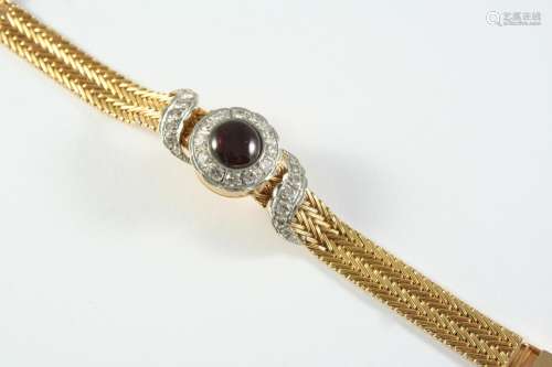 A LADY'S 18CT GOLD, GARNET AND DIAMOND WRISTWATCH BY BREITLI...