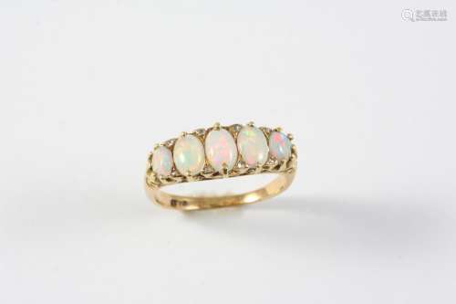 AN OPAL FIVE STONE RING the five graduated oval-shaped solid...