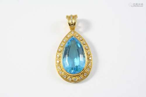 A BLUE TOPAZ AND DIAMOND PENDANT the pear-shaped blue topaz ...