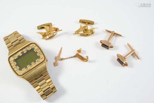 A PAIR OF GOLD GALLEON CUFFLINKS a pair of garnet and gold c...