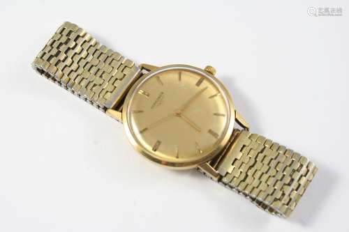 A GENTLEMAN'S GOLD WRISTWATCH BY LONGINES the signed gold co...