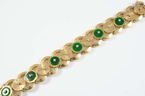 A JADE, DIAMOND AND GOLD BRACELET formed with alternate jade...