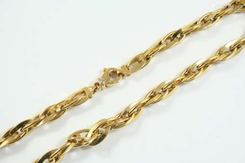 A GOLD FANCY LINK NECKLACE the clasp mounted with a circular...
