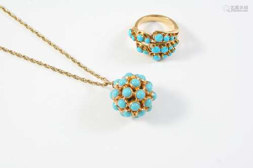 A TURQUOISE AND GOLD SPHERICAL PENDANT mounted with circular...