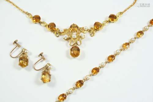 A CITRINE AND CULTURED PEARL NECKLACE mounted with circular-...