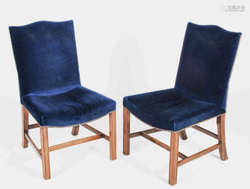 A pair of 20th century mahogany and blue velvet upholstered ...