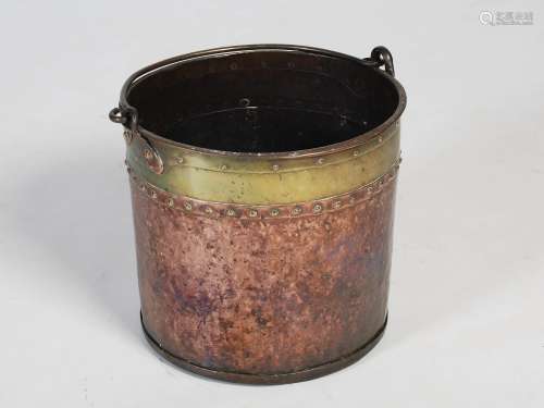 A late 19th century copper and brass fuel bin, of circular f...