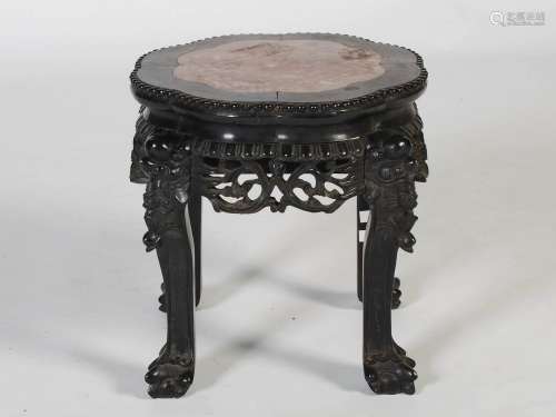 A Chinese dark wood jardiniere stand, Qing Dynasty, the shap...