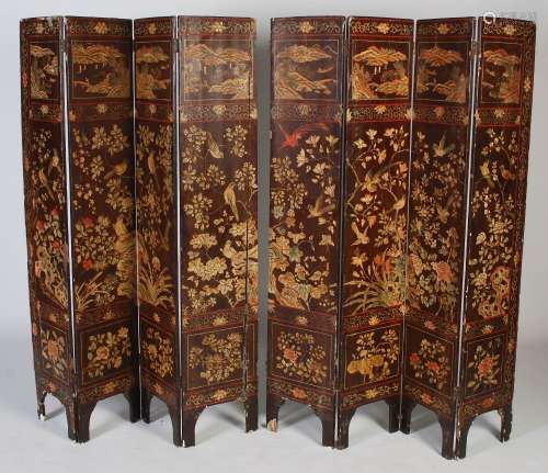A Chinese lacquer eight-fold screen, Qing Dynasty, with inci...