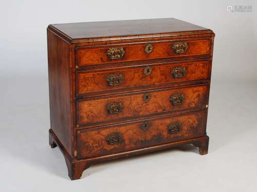An 18th century walnut chest, the rectangular top with chevr...