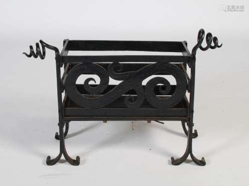 An Arts & Crafts wrought iron fire basket, of rectangular fo...