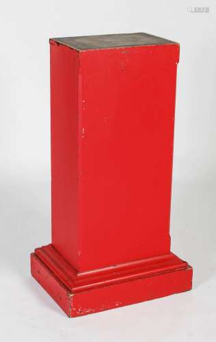 A red painted pine pedestal, 20th century, the rectangular s...