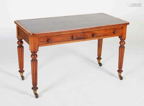 A 19th century mahogany library table in the manner of Gillo...