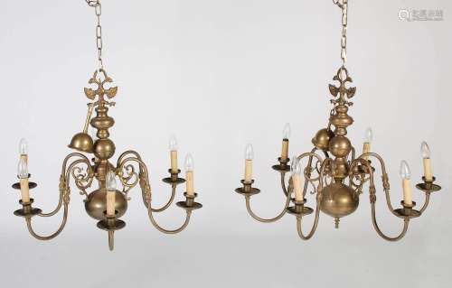 A pair of early 20th century brass six light chandeliers, wi...