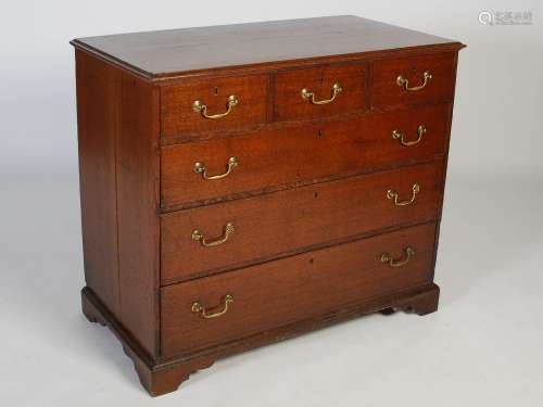 A George III oak chest, the rectangular top with moulded edg...