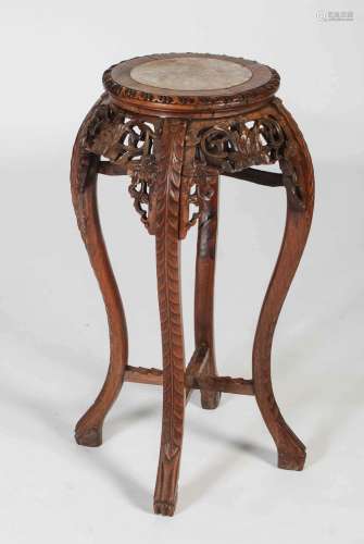 A Chinese dark wood jardiniere stand, Qing Dynasty, the circ...
