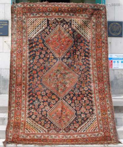 A Persian rug, late 19th/ early 20th century, the rectangula...