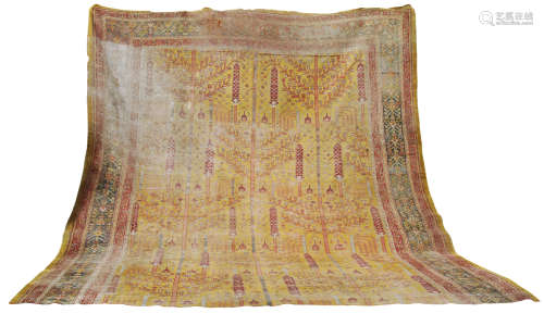 A Golden Ushak carpet, late 19th century, the ochre coloured...