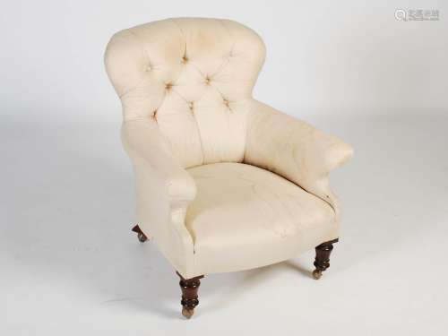 A 19th century walnut armchair, the button upholstered back ...