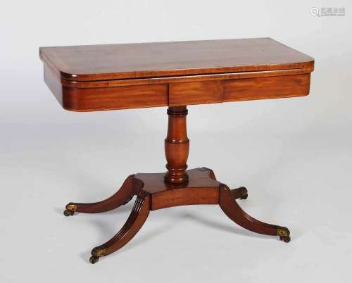 A 19th century mahogany and rosewood banded pedestal tea tab...