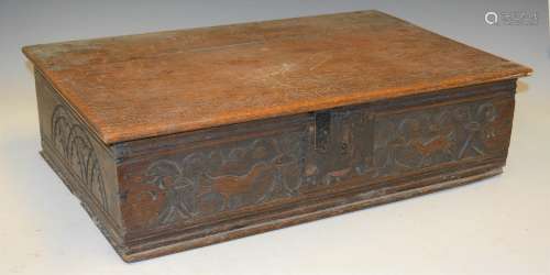 An antique Bible box, the hinged rectangular top above a fri...