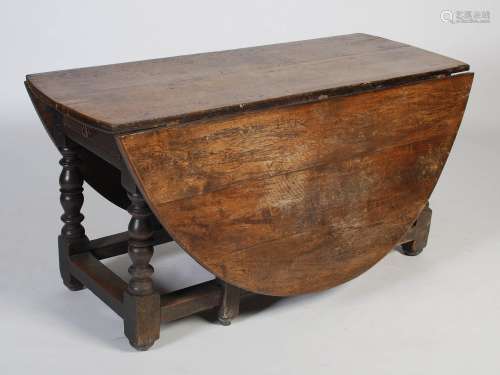 A 18th century and later composite oak dining room suite, co...