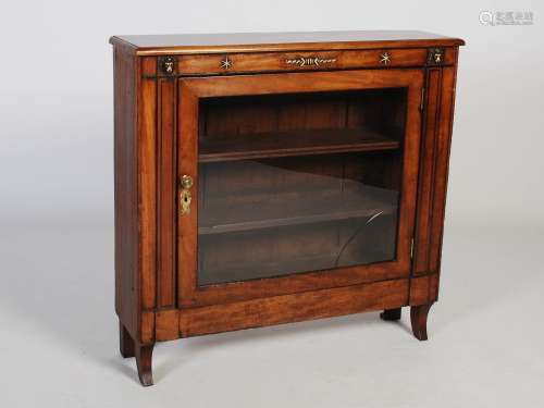 A 19th century Regency style mahogany side cabinet, the rect...