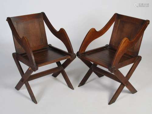 A pair of oak Arts & Crafts Glastonbury chairs, with rectang...