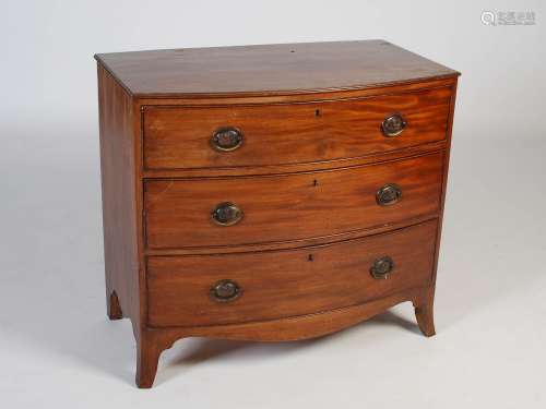 A George III mahogany bowfront chest, the shaped top with mo...