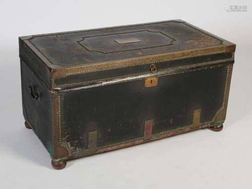 A George III leather and brass studded trunk/ chest, the hin...