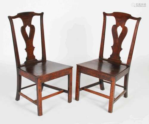 A pair of George III oak Provincial side chairs, with pierce...