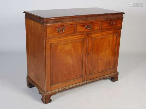 An early 19th century mahogany side cabinet, the rectangular...