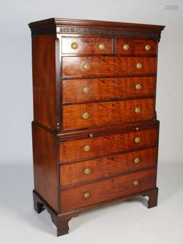 A George III mahogany chest on chest, the moulded and dentil...