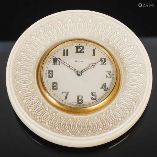 An early 20th century ivory desk clock, the Swiss-made eight...